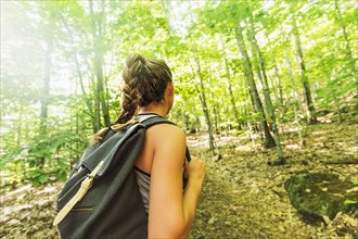 Female hiker in forest