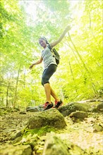 Female hiker in forest