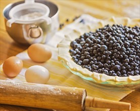 Ingredients for berry pie on table