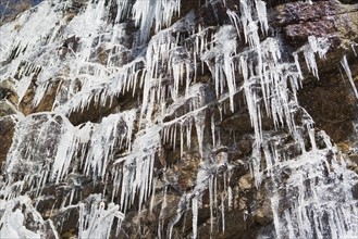 Low angle view of frozen waterfall