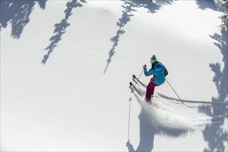 Elevated view of woman skiing