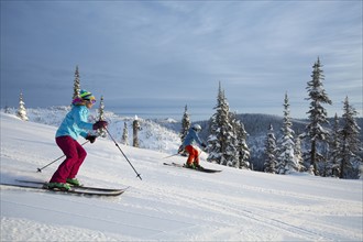 Side view of skiing couple
