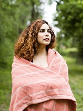 Woman covered with blanket
