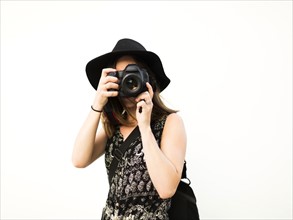 Woman taking photos during vacations