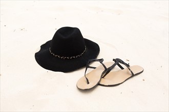 Sandals an sunhat on sand
