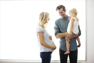 Portrait of family with daughter (2-3)