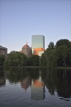 Copley Square reflecting in Boston public Garden pond