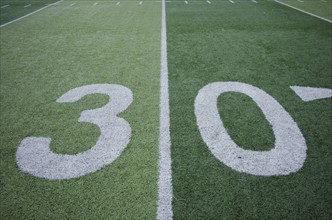 Football field marking of 30 yard line