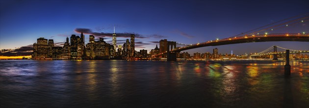 Lower Manhattan Bridge and Brooklyn Bridge at sunset. New York City, New York, USA.