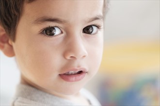 Portrait of boy (2-3) looking at camera.