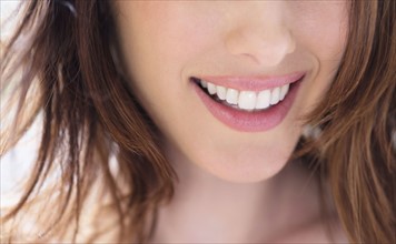 Close up of smiling woman.