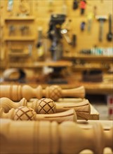 Wooden parts of furniture in carpentry workshop