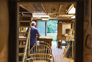 Carpenter in workshop