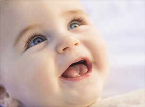 Portrait of laughing baby boy (6-11 months)