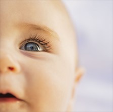 Close-of baby boy's (6-11 months) blue eye