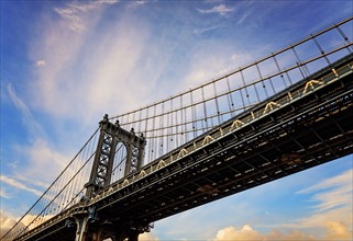 Hudson River, Brooklyn Bridge against sky