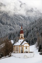 Church with forest in background