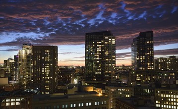 Dramatic sky over city at dusk