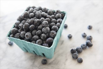 Heap of blueberries in container
