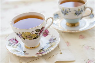 Tea in tea cup on table