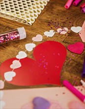 Decorations for Valentine's Day on wooden table
