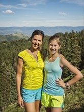 Mother and daughter (14-15) in mountains