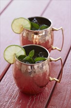 Moscow mule cocktails in silver mug