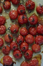 Baked cherry tomatoes with olive oil and salt