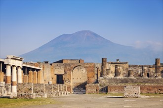 Old ruins and mount Vesuvius in background