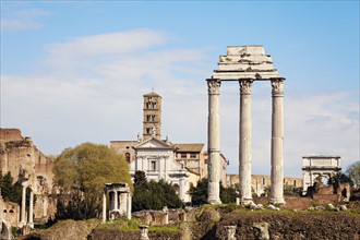 Columns of Roman Forum against blue sky