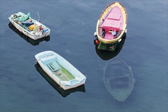 Boats floating on sea