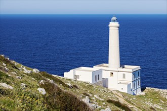Lighthouse Punta Palascia against sea