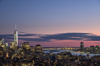 Skyline of New York at dusk with One World Trade Center in background. USA, New York, New York City.