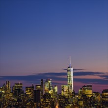 Skyline of New York at dusk with view of One World Trade Center. USA, New York, New York City.