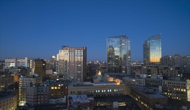 Modern downtown district at dawn