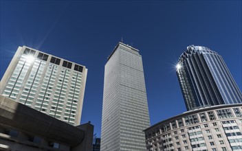 Modern skyscrapers in financial district on sunny day