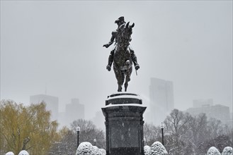 Statue of George Washington on horse in winter