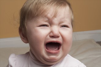 Portrait of baby girl crying