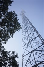 Low-angle view of electricity pylon