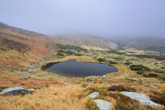 Lake Nesamovyte in fogy landscape