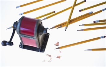 Pencils and antique pink pencil sharpener.