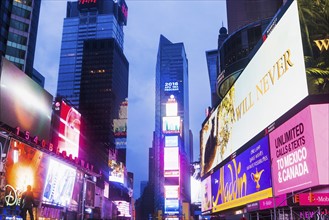 New York City, Times Square, Neon lights illuminating street