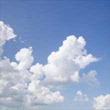 Cumulus clouds in blue sky