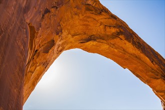 Low angle view of natural arch against clear sky