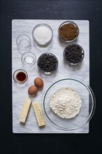Overhead view of bowl of ingredients on marble board