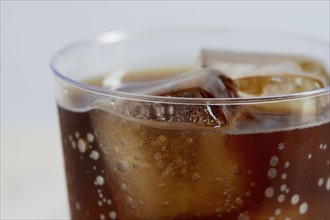 Close-up of cold drink with ice cubes