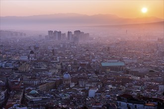 Italy, Campania, Naples, Cityscape at sunrise