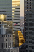 Massachusetts, Boston, Office buildings and US flag on roof