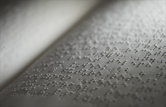 Book with Braille text.