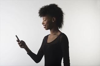 Young woman with mobile phone.